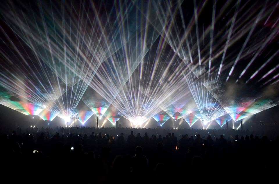 Laser beams over a live event stage